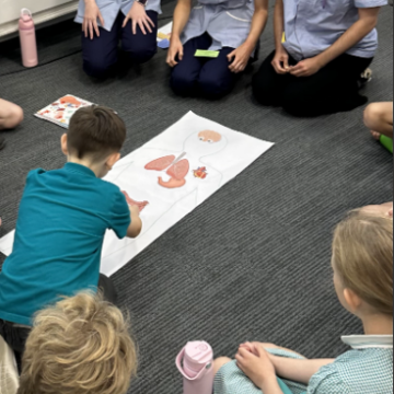 Nursing students interact with the school children